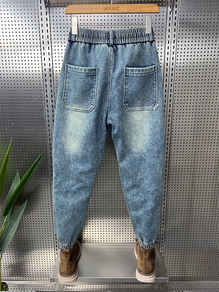 Mens Washed Denim Jeans With A Vintage Design, Featuring Button Detailing And A Tapered Leg